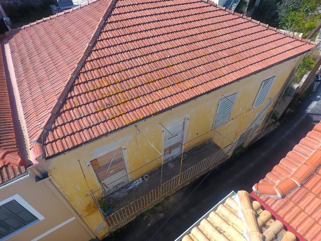 Aerial views of the facade with balcony