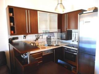 VIEW OF THE OPEN PLAN KITCHEN