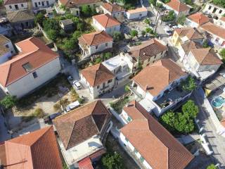 Aerial view of house and surrounding area