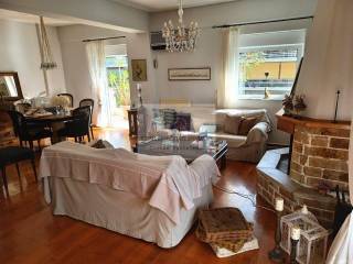 LIVING - DINING ROOM WITH FIREPLACE