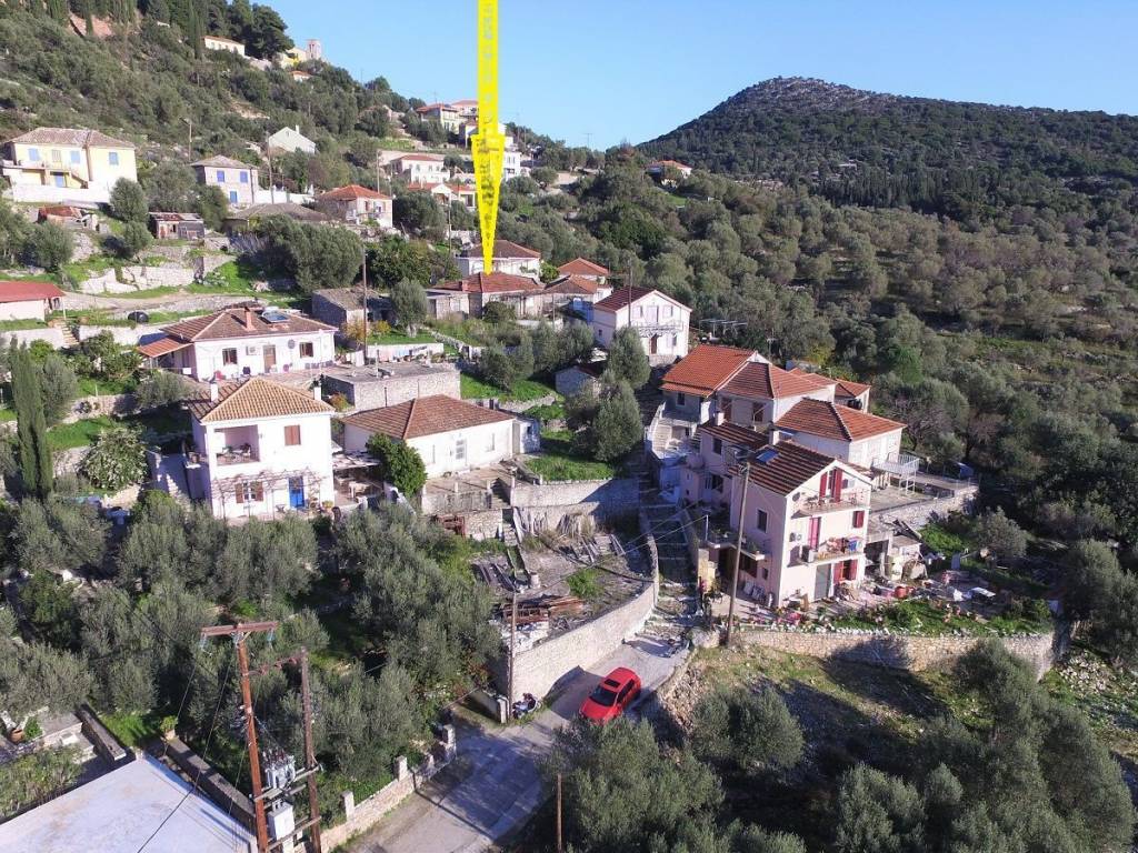 Aerial views of property and location of house