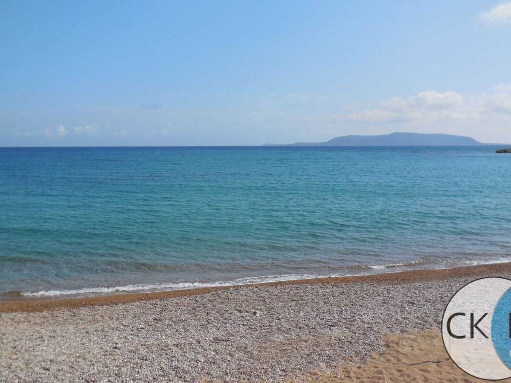 Loutsa beach, 10 minutes by car.