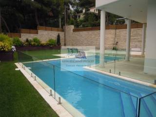 SWIMMING POOL AND PART OF THE GARDEN