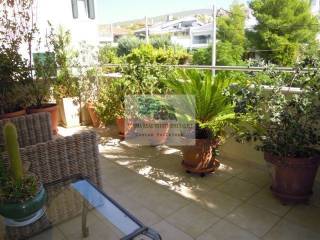 FRONT VERANDA ON THE FIRST FLOOR