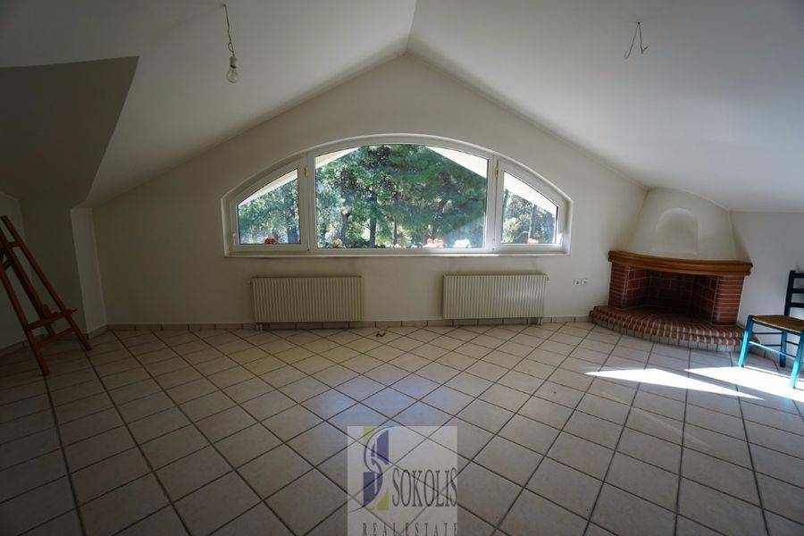 attic with fireplace