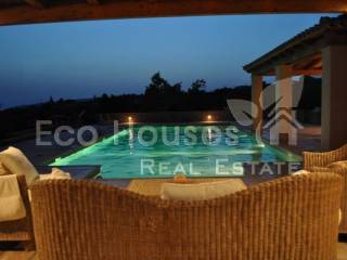 Sitting area &amp; dining area by the swimming pool