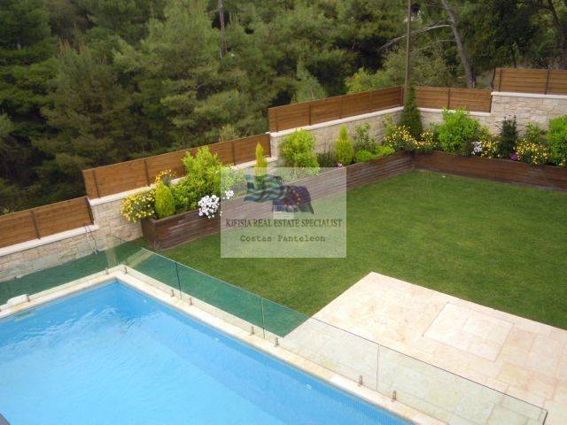 PANORAMIC PART OF SWIMMING POOL AND GARDEN