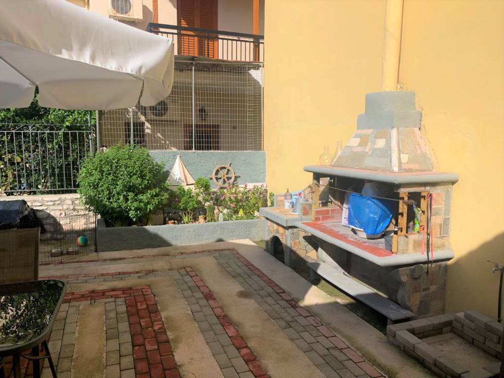 Bbq &amp; back yard of house for sale in Vathi, Ithaca Greece