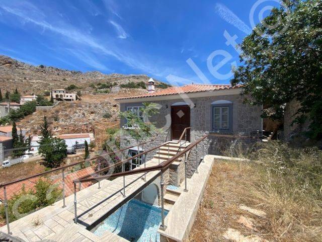 Pomegranate House, top floor entrance over water feature