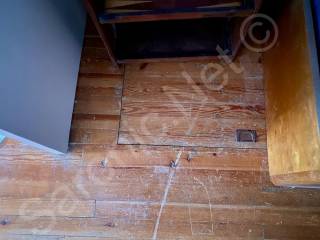 Original trapdoor, corner bedroom floor, stairs still there