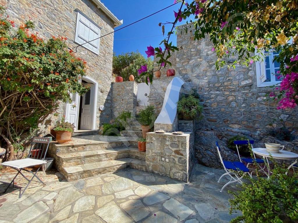 Entrance terrace to main house left, guest house right