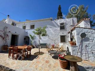 Garden Residence, Sunny courtyard with BBQ and entrance door