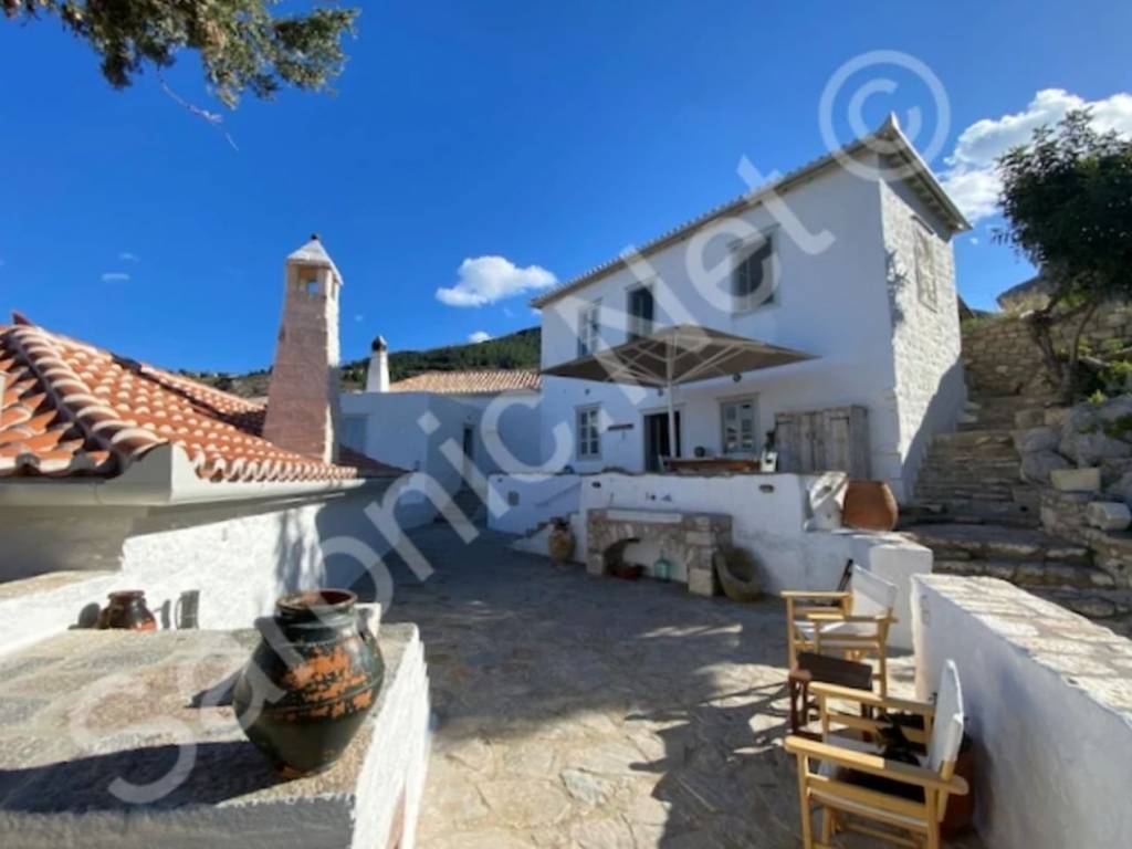 Paved front terrace to entrance of Hillside Property