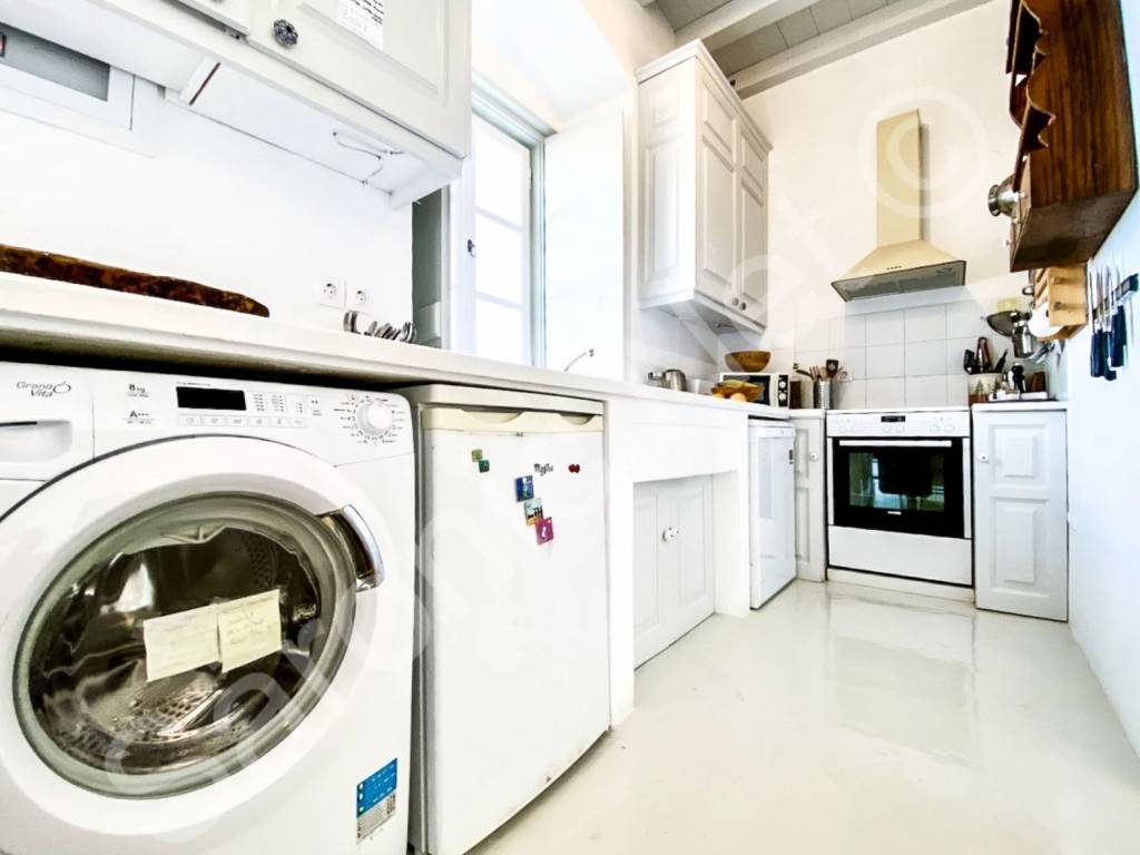 Kitchen with cupboards and all electrical appliances.