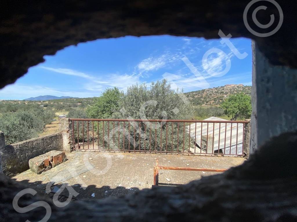 Side view of countryside from newly railed terrace.