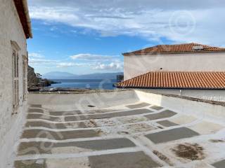 Large walled upper floor terrace West view of sea &amp; harbour.