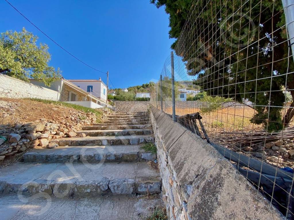 Impressive stone steps lead all the way up the boundary