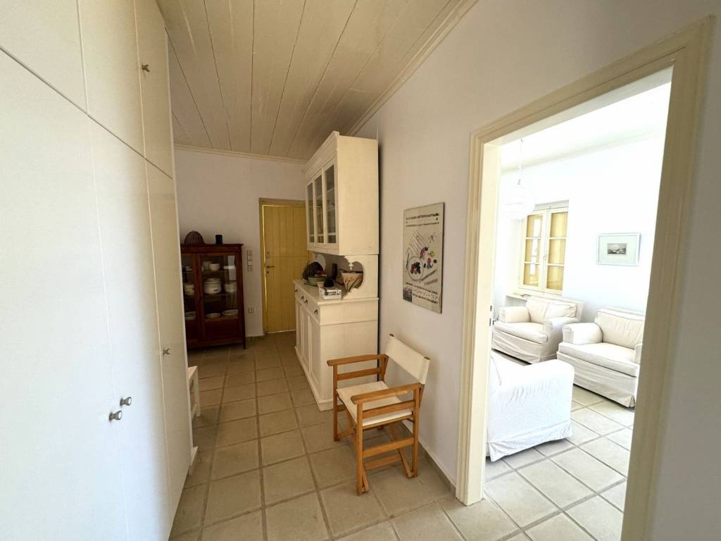 Kitchen and living areas seen from the passageway