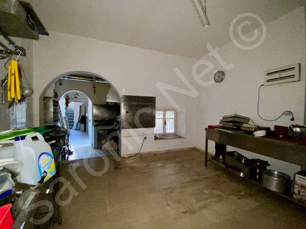 Original kitchen, window under ext stairs in courtyard