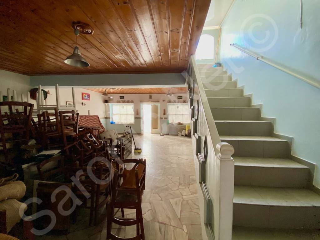 Original taverna dining room, stairs to roof terrace dining