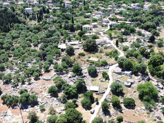 Aerial view of the property and the surrounding area