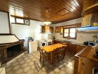 Kitchen area with fireplace