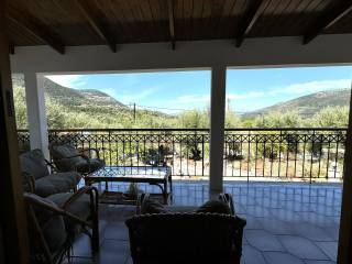 Covered veranda with tiled floor