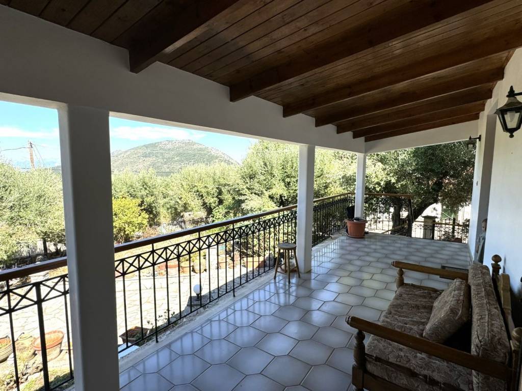 Covered veranda with tiled floor