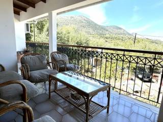 Covered veranda with tiled floor