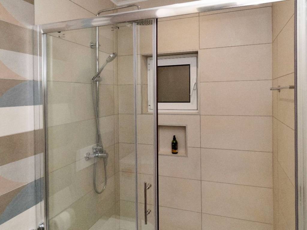 bathroom with raining shower