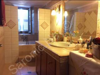 Family bathroom with jacuzzi bath and shower above