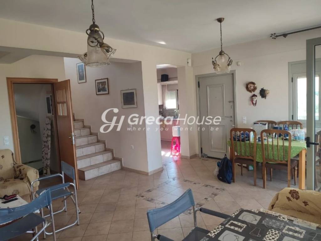 Detached house with sea view for sale in Evia.