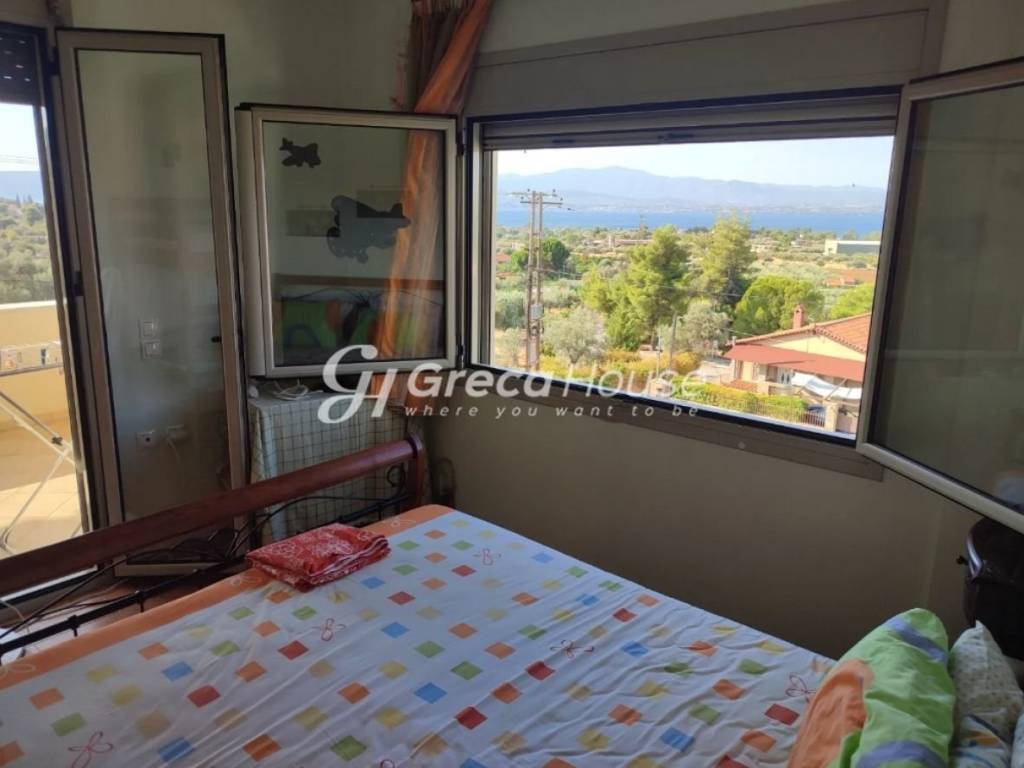 Detached house with sea view for sale in Evia.