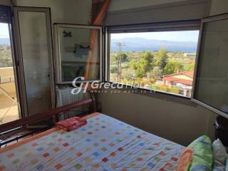 Detached house with sea view for sale in Evia.
