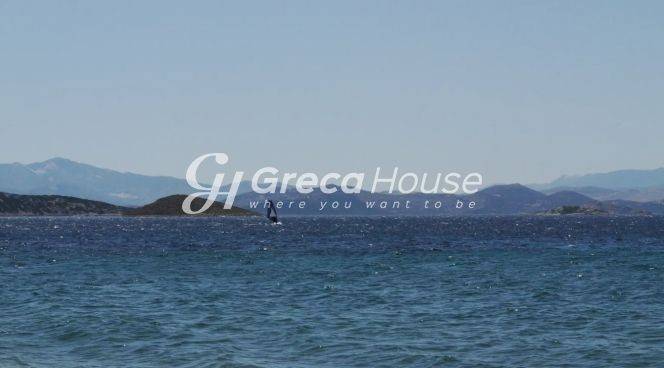 Παραθαλάσσιο Οικόπεδο με Κατοικία προς πώληση στα Στύρα