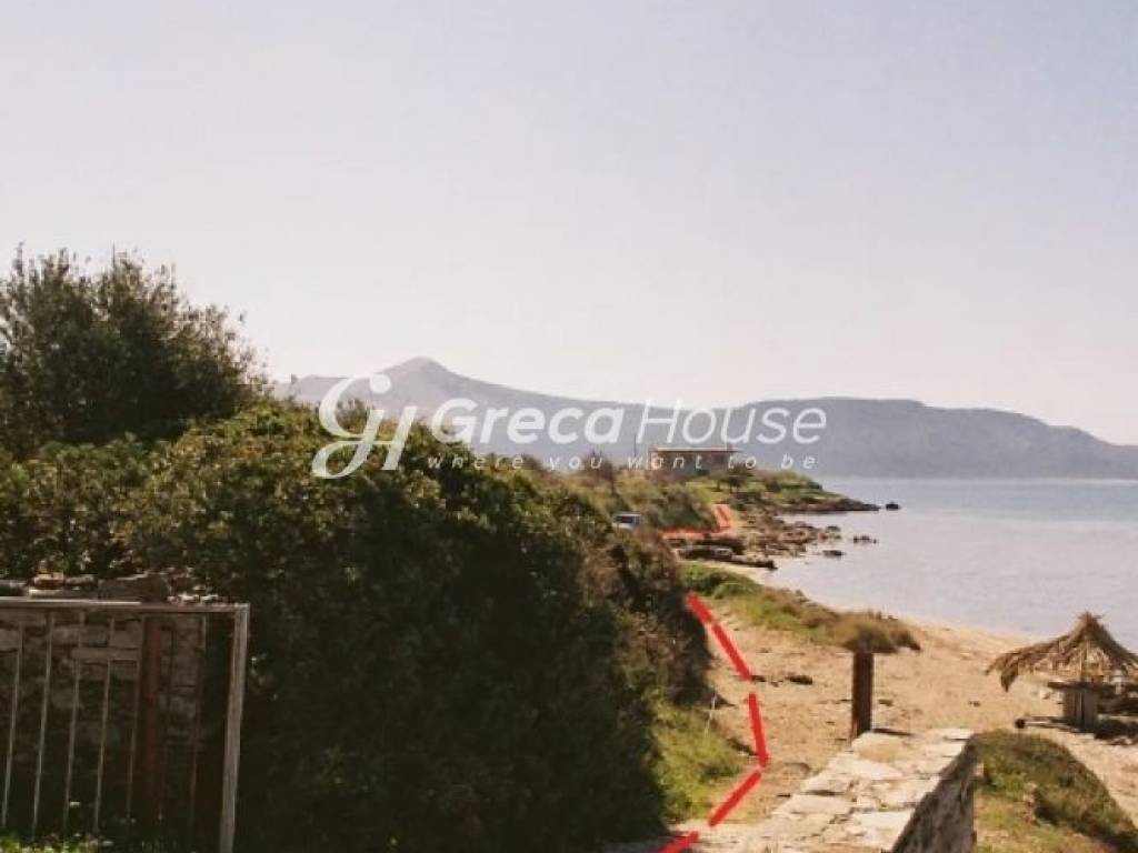 Παραθαλάσσιο Οικόπεδο με Κατοικία προς πώληση στα Στύρα