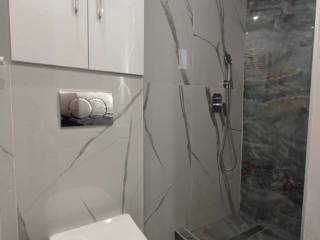 Forumland Real Estate, Μπάνιο