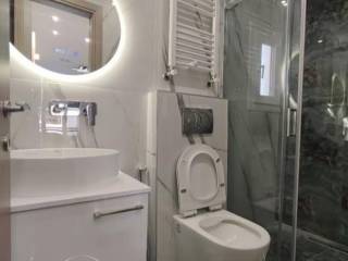 Forumland Real Estate, Μπάνιο