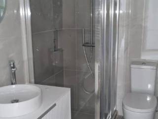 Forumland Real Estate, Μπάνιο