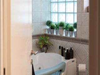 Forumland Real Estate, Μπάνιο