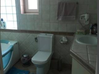 Forumland Real Estate, Μπάνιο