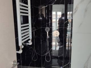 Forumland Real Estate, Μπάνιο