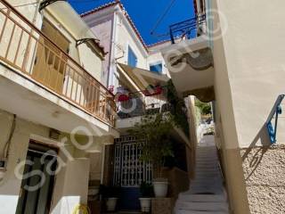 Steps from street up to apartment and studio with terrace.
