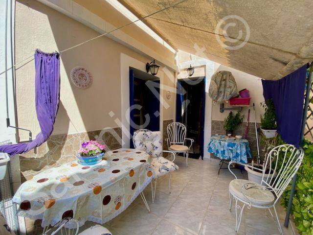 Large dining balcony terrace with sunshade.