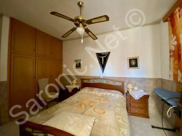 Floor to ceiling built in wardrobes in master bedroom.