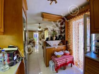 From kitchen down to living room. Doors to balcony terrace.