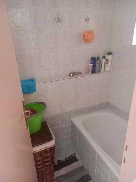 Bathroom of studio below main apartment.