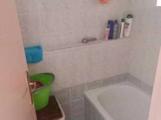 Bathroom of studio below main apartment.