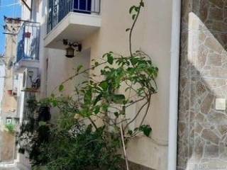 Pretty shrubbed pots at entrance to apartment and studio.