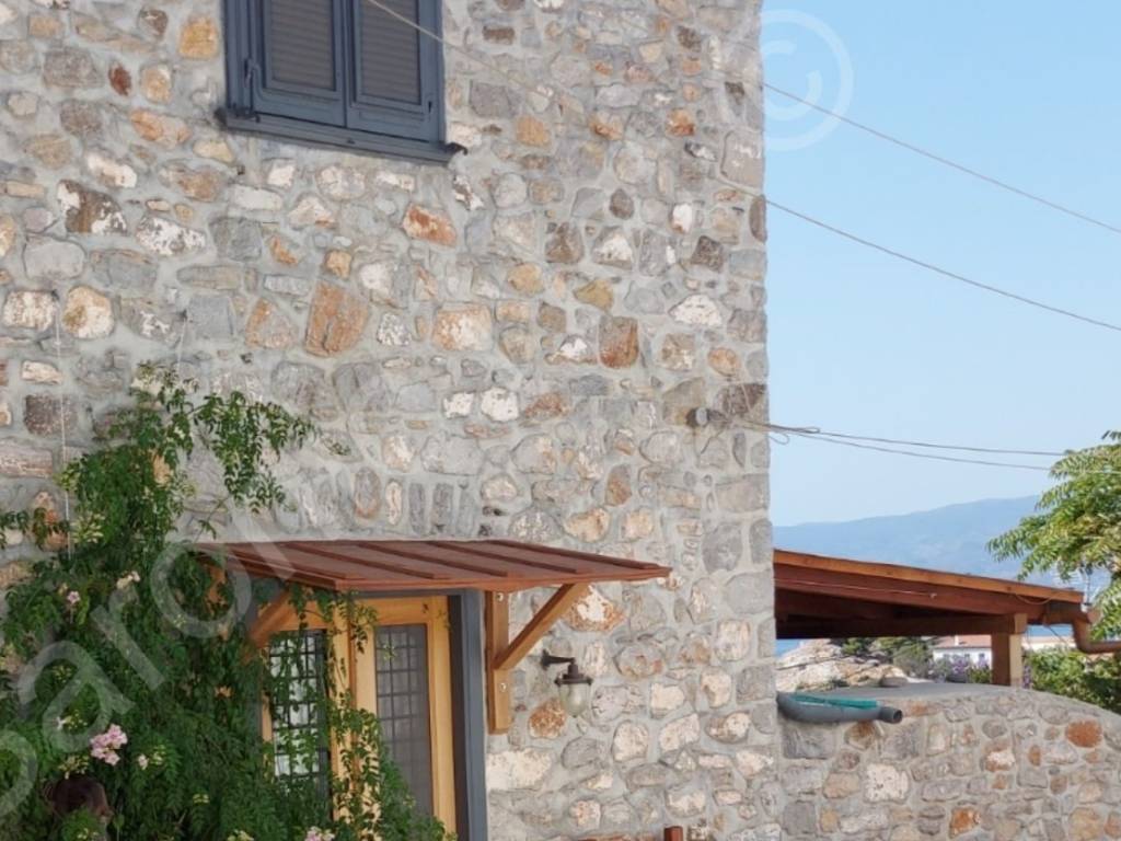 East street entrance to mid-level of this 3 level house